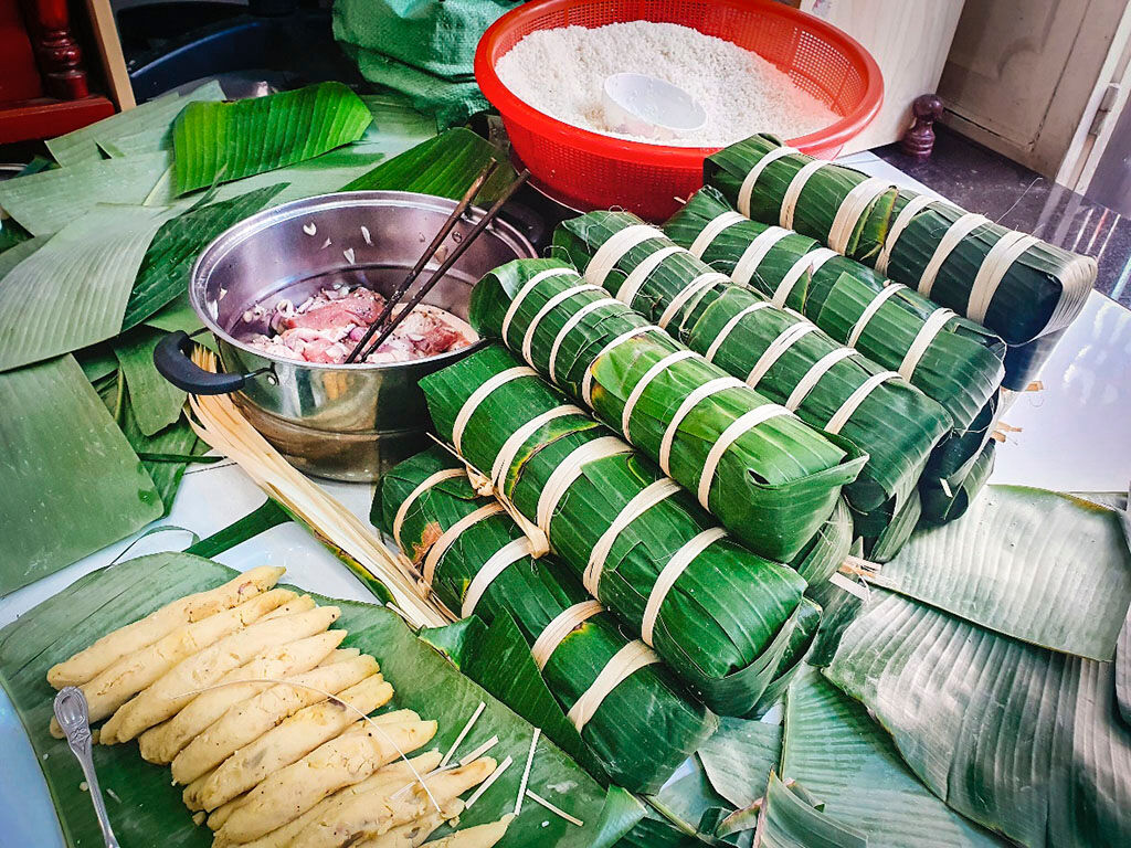 Explore bánh tét Huế spots on an eco-friendly tour